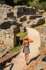 Woman walking in the archaeological ruins of Butrint or Butrinto National Park in Albania