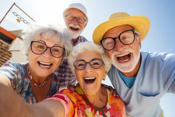 Foto op Plexiglas Low angle view of senior citizens having fun and looking at the camera © wolfhound911