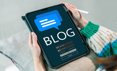 Social media online content, freelance worker, working online, content creator, woman using tablet, woman reading blog online on computer at home