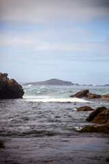 Sandy paradise at Buizinhos Beach, Porto Covo. Gaze upon the distant allure of Pessegueiro Island. Nature's beauty captured from Buizinhos shore.
