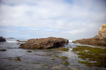 Sandy paradise at Buizinhos Beach, Porto Covo. Gaze upon the distant allure of Pessegueiro Island. Nature's beauty captured from Buizinhos shore.