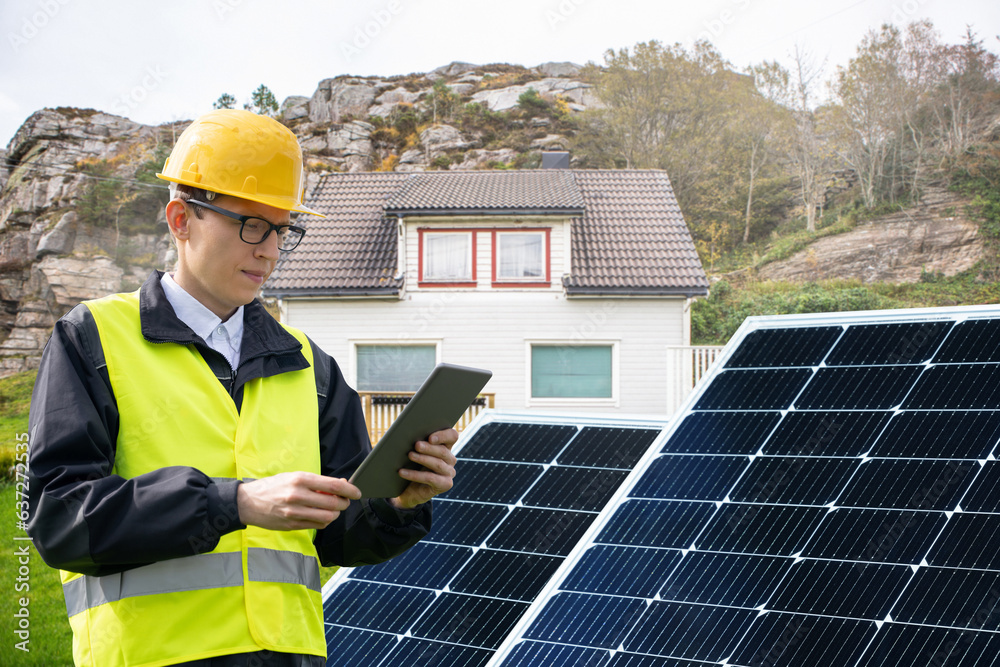 Aufkleber engineer with tablet computer on a background of mobile solar energy power station