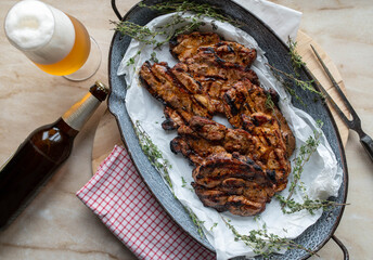 Traditional german grilled pork steaks. Marinated with beer. 
