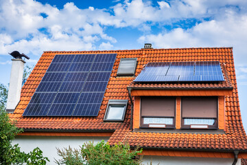 Photovoltaic panels on the roof of family house, solar panels.