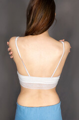 The beautiful woman's body on gray background. mockup for tattoos, underwear, jewelry
