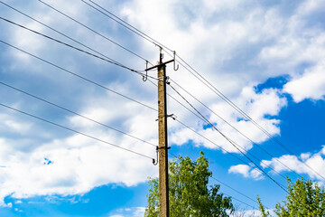 Power electric pole with line wire on colored background close up