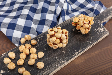 Turkish Dessert Cezerye with Hazelnut, Almond or pistachio. Turkish delight with carrot nuts atom...