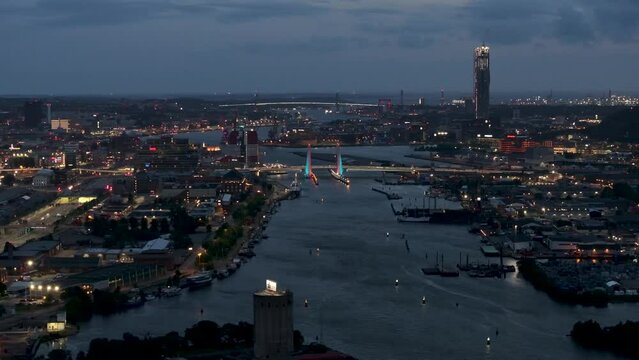 Stunning night time panoramic cityscape. Big city along the river, urban, populated area. Gothenburg, Sweden.