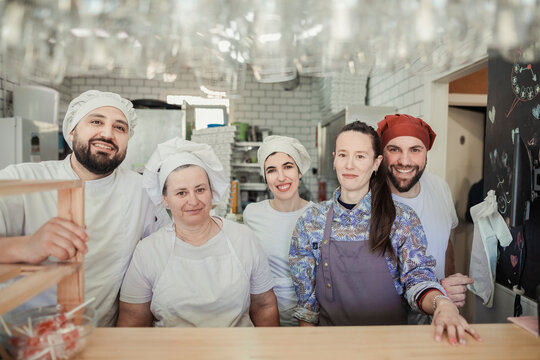 Portrait of the crew of a pizzeria restaurant