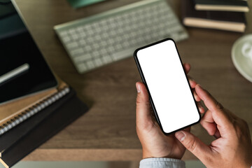 businessman holding a blank screen smartphone mobile with blank screen blank for your advertising text message communication background workplace job copy space