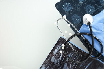 Images of MRI or magnetic resonance imaging with stethoscope and pills. Place for text