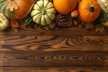 Capturing the essence of autumn's bounty from above. Pumpkins and assortment of fall elements a...