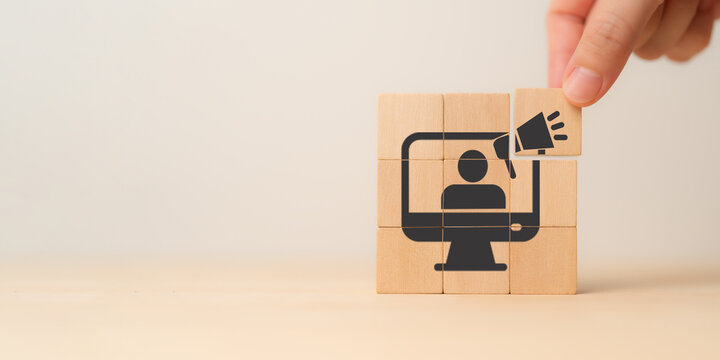 Influencer marketing concept. Placing the wooden cube blocks with influencer marketing strategy symbol, such as celebrities, bloggers, social media personalities, to promote products and services.