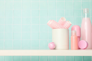 A shelf in the bathroom with care products.