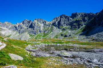 Fototapeta na wymiar Sunny day landscape of the High Tatras, Carpathian Mountains.