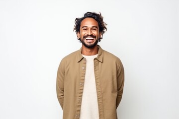 Obraz premium Medium shot portrait of an Indian man in his 30s against a white background
