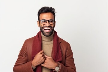 Obraz premium Medium shot portrait of an Indian man in his 30s against a white background