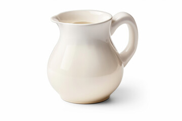 a white pitcher with a handle on a white surface