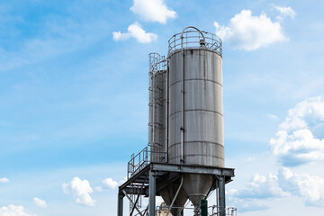 Metal industry silo on a scaffold.