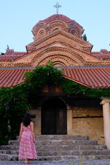 Church of Virgin Mary Peribleptos of Ohrid and a woman visiting