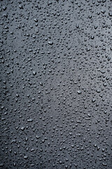 raindrops on metal surface in rainy days