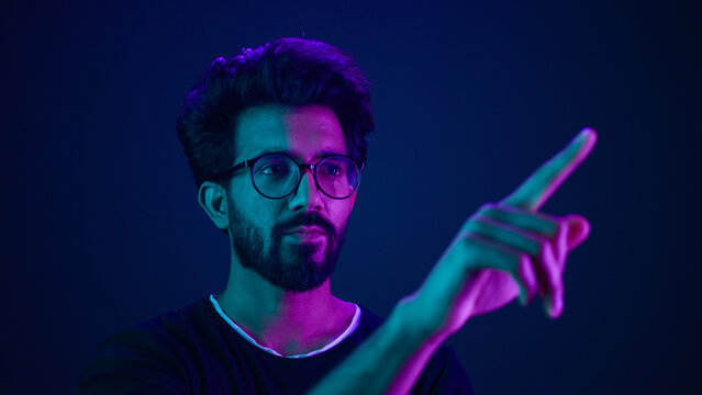 Infographic hologram backdrop template ultraviolet neon background pensive man hi-tech programmer engineer touch air space futuristic user interface HUD digital cyber technology virtual screen icon