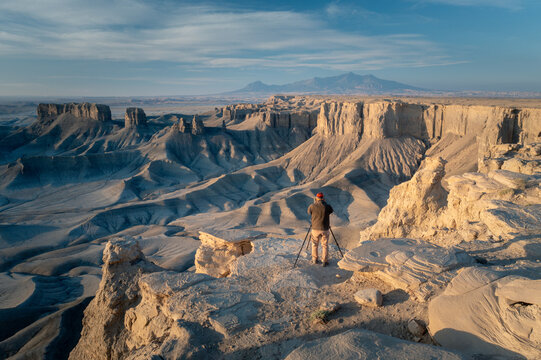 Capturing the Moonscape: Photographer in Action at Utah Badlands' Overlook