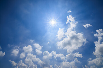 Naklejka na ściany i meble Blue sky and white clouds with sun. sky clouds nature background.