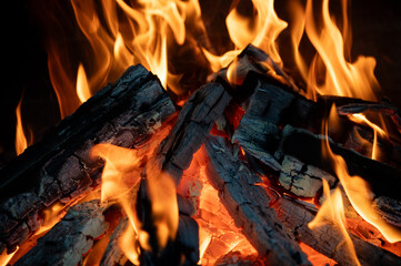 Close-up of a fire burning in a fireplace.