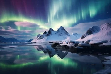 Gordijnen Winter landscape with reflection of aurora borealis on snowy mountains, frozen coast, water at night. Lofoten Islands, Norway. Aurora Borealis reflection in water ice. Starry Sky and Aurora © yuanfeng Z