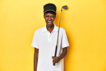 African golfer woman with her golf club, sports concept, screaming very angry and aggressive.