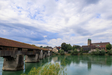 Obraz premium The historic old wooden bridge between Germany and Switzerland over the Rhine at Bad Säckingen