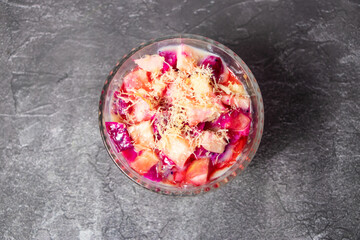 Fruits Custrad with dragon fruit and strawberry served in dish isolated on background top view of bangladesh food
