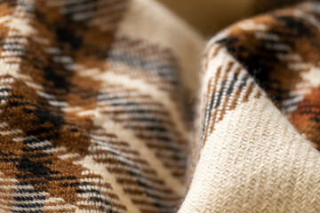 Soft checkered woolen cloth, fashion industry, cozy blanket in warm tones