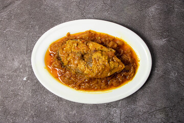 Ilish Bhuna or hilsa Bhuna korma karahi masala with gravy served in dish isolated on background top view of bangladesh food