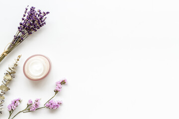 Face skin care products - cosmetic cream for face or body, top view