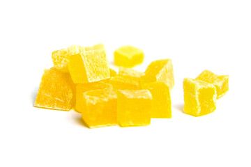 Diced mango dried fruits isolated on white background. Dehydrated mango chips dices