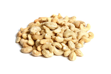 Cashew nut heap isolated on white background. Piled cashew nuts on white