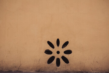 Yellow Roman wall texture background, Italy. Ventilation hole  on the shabby yellow wall facade....
