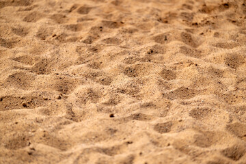 Sand nature texture in summer sun as background