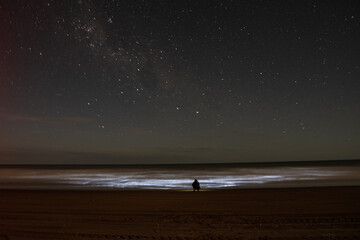 Photograph of a man by the sea in Buenos Aires, Argentina looking at the Orion's Belt