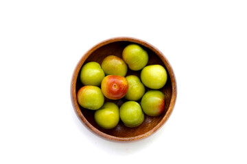 Fresh green plum on white background