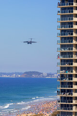 C-17 Globmaster in the sky over the beach for a demonstration at Pacific Airshow. Gold Coast, Australia