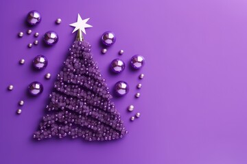 Fototapeta na wymiar glass beads laid out in shape of Christmas tree on purple