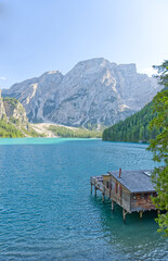 Lake Braies (or Lago di Braies) hut on the lake famous lake in Dolomites Alps Italy Europe extra wide panorama