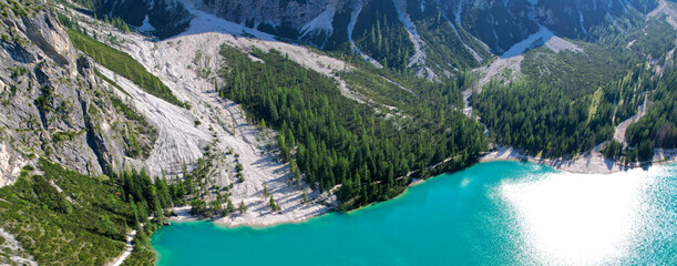 Lake Braies (or Lago di Braies) famous lake in Dolomites Alps Italy Europe extra wide panorama aerial