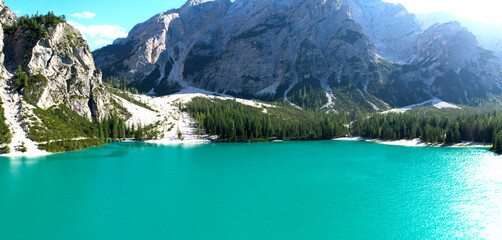 Lake Braies (or Lago di Braies) famous lake in Dolomites Alps Italy Europe extra wide panorama
