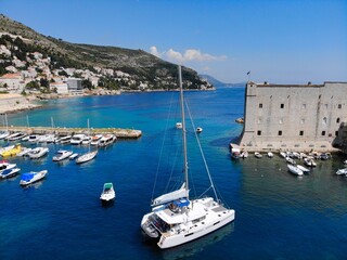Fototapeta na wymiar Catamaran sailing in Dubrovnik