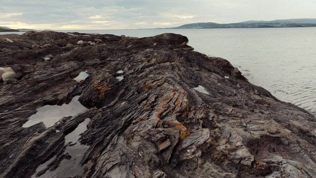 Aerial Vistas of Volcanic Rocky Norway: Amid Cloudy Cold Weather, Embracing the Wild