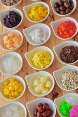 candied topping on dessert in little bow